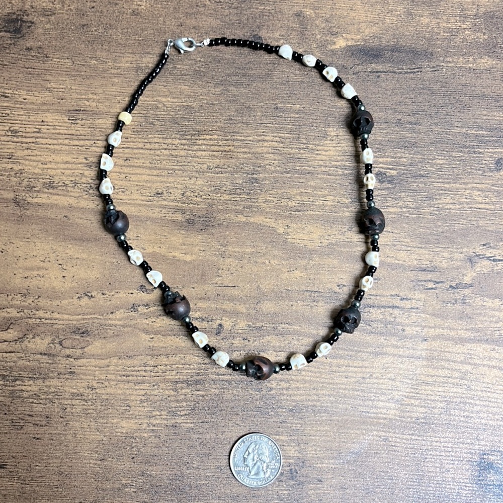 Beaded Skull Necklace- Carved Beads. Length of necklace 14 inches.